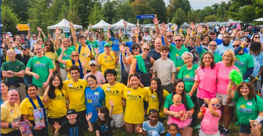 Walk for Alopecia participants cheering together at the NAAF event