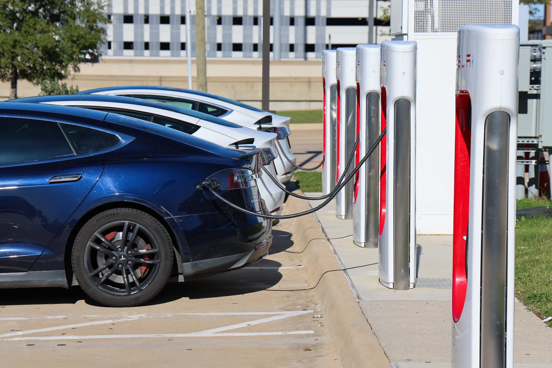Electric vehicles connected to Level 2 charging stations at a commercial property