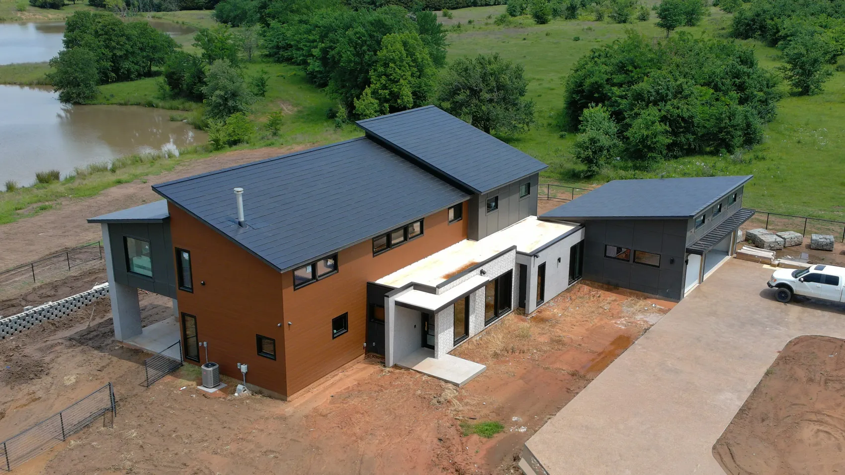 Tesla Solar Roof installed on a new construction Texas home by Good Faith Roofing
